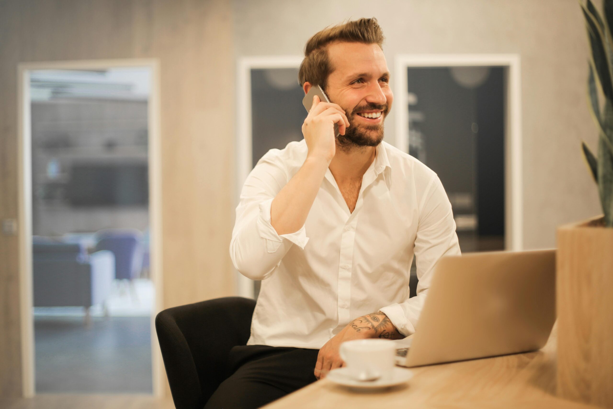 fundraising business professional talking on the phone happy